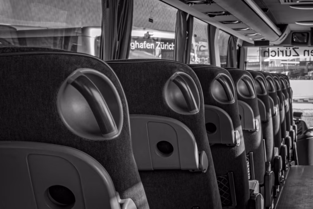 a black and white photo of the inside of a bus